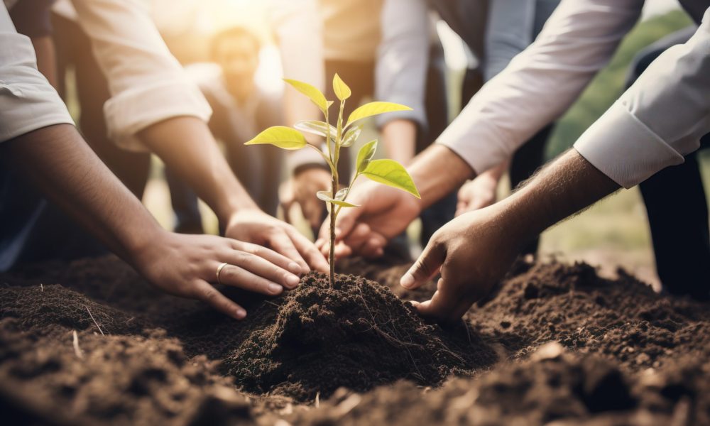 Businessmen and community together planting trees for sustainable development goals. company or businesses and corporations that care about the environment and ecosystem in greenery company.
